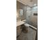 Updated bathroom features a walk-in shower with attractive tile accents at 7515 Brookhaven Ct, Tampa, FL 33634