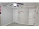 Bedroom featuring two doors, overhead lighting and space at 7515 Brookhaven Ct, Tampa, FL 33634