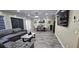 Open-concept living room and dining area with stylish décor and comfortable seating at 7515 Brookhaven Ct, Tampa, FL 33634