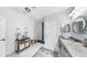 Modern bathroom features double sinks, walk-in shower, and elegant design at 7849 52Nd E Ter, Bradenton, FL 34203