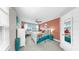 Bright bedroom features coastal decor, ceiling fan and great natural light at 7849 52Nd E Ter, Bradenton, FL 34203