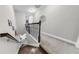 Bright hallway features carpet flooring, decorative railings that offers an inviting transition between floors at 7849 52Nd E Ter, Bradenton, FL 34203