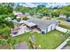 Large backyard featuring a patio with outdoor dining area, well-maintained lawn, and privacy fence at 801 Kirkcaldy Way, Valrico, FL 33594
