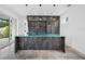 Modern kitchen with a large island, sleek countertops, stainless steel appliances, and ample natural light at 805 Paris S Ave, St Petersburg, FL 33701
