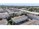 Wide aerial view of modern community with well-kept grounds and nearby cityscape at 834 N Oregon Ave, Tampa, FL 33606