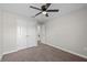 Bedroom with ceiling fan, closet, neutral walls and carpet at 834 N Oregon Ave, Tampa, FL 33606