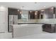Modern kitchen with stainless steel appliances, stylish backsplash, and center island at 834 N Oregon Ave, Tampa, FL 33606