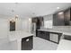 Contemporary kitchen boasting a center island, stainless steel appliances, and ample storage at 834 N Oregon Ave, Tampa, FL 33606