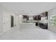 Modern kitchen featuring stainless steel appliances, a center island, and stylish pendant lighting at 834 N Oregon Ave, Tampa, FL 33606