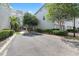 Convenient parking area with lush landscaping providing a green and inviting atmosphere at 834 N Oregon Ave, Tampa, FL 33606