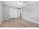 This bedroom offers ample closet space and laminate flooring throughout at 8806 Bayaud Dr, Tampa, FL 33626