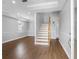 The living room features elegant hardwood floors and a staircase, offering a comfortable living space at 8806 Bayaud Dr, Tampa, FL 33626