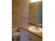 Bathroom featuring a vanity, toilet, and tiled shower/tub at 9320 Crescent Loop Cir # 304, Tampa, FL 33619