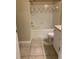 Clean bathroom with tub and shower, toilet, and vanity at 9320 Crescent Loop Cir # 304, Tampa, FL 33619