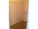 Walk-in closet with shelving for clothing and storage at 9320 Crescent Loop Cir # 304, Tampa, FL 33619