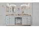 Bright bathroom with double vanity, marble countertops, and a convenient makeup area at 9327 Hunters Park Way, Tampa, FL 33647