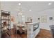 View of the dining room, showcasing hardwood floors and cozy fireplace at 9327 Hunters Park Way, Tampa, FL 33647