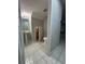 Bathroom featuring vanity sink, toilet, and doorway leading to a closet at 10823 Brickside Ct, Riverview, FL 33579
