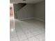 Bright living room featuring tile flooring and ample natural light at 10823 Brickside Ct, Riverview, FL 33579