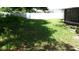 Backyard features a well-kept lawn and a privacy fence at 10871 86Th Ave, Seminole, FL 33772