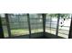 Screened porch featuring large windows offering views of the outdoors at 10871 86Th Ave, Seminole, FL 33772