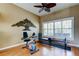 Bright workout area featuring an exercise bike, and decorative tree at 11121 Clayridge Dr, Tampa, FL 33635