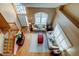 Open foyer with a view of the staircase, chandelier, and living room below at 11121 Clayridge Dr, Tampa, FL 33635