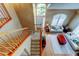 Overhead view of the foyer showing staircase, chandelier, and seating area at 11121 Clayridge Dr, Tampa, FL 33635