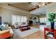 Spacious open-concept living room featuring hardwood floors and neutral decor at 11121 Clayridge Dr, Tampa, FL 33635