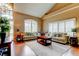 Inviting living room with high ceilings, large windows, plantation shutters, and neutral decor at 11121 Clayridge Dr, Tampa, FL 33635