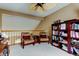 Upstairs loft with comfortable seating, book shelves and natural light at 11121 Clayridge Dr, Tampa, FL 33635