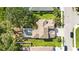Stunning aerial view of a single-Gathering home with a private screened pool and beautifully landscaped yard on a quiet street at 1178 Fraser Pine Blvd, Sarasota, FL 34240
