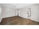 Spacious bedroom featuring wood flooring, a ceiling fan, and neutral paint at 1178 Fraser Pine Blvd, Sarasota, FL 34240