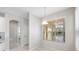 Cozy breakfast nook filled with natural light from the large window overlooking the backyard at 1178 Fraser Pine Blvd, Sarasota, FL 34240