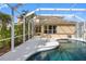 Gorgeous pool with a covered patio overlooking the well-maintained yard at 1178 Fraser Pine Blvd, Sarasota, FL 34240
