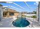 Relaxing screened-in pool area perfect for outdoor entertaining and enjoying the Florida sunshine at 1178 Fraser Pine Blvd, Sarasota, FL 34240