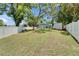 Spacious fenced backyard offering ample room for recreation and privacy at 1207 Oak Valley Dr, Seffner, FL 33584