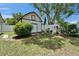 Nicely landscaped backyard with a storage shed at 1207 Oak Valley Dr, Seffner, FL 33584