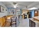 Charming dining area with updated floors open to the kitchen, perfect for Gathering meals at 1207 Oak Valley Dr, Seffner, FL 33584
