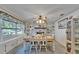 Dining room showcasing a decorative stone fireplace and adjacent built-in shelving at 1207 Oak Valley Dr, Seffner, FL 33584