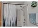 Clean, bright shower featuring a shower curtain and handheld shower head at 1207 Oak Valley Dr, Seffner, FL 33584