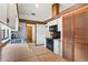 Bright kitchen featuring tile countertops, wooden beams, and stainless steel sink at 12506 Twisted Oak Dr, Tampa, FL 33624