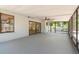 This screened-in lanai provides views of the backyard and easy access to indoors at 12506 Twisted Oak Dr, Tampa, FL 33624