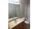 Bathroom with neutral walls, a tiled shower and a single sink vanity at 12820 Belvedere Song Way Way, Riverview, FL 33578