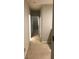 Carpeted hallway with neutral paint color and white trim at 12820 Belvedere Song Way Way, Riverview, FL 33578