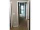 Hallway with neutral walls and carpet flooring, leading to other rooms in the house at 12820 Belvedere Song Way Way, Riverview, FL 33578