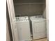 Laundry room featuring a white washer and dryer units at 12820 Belvedere Song Way Way, Riverview, FL 33578