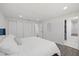 Bright bedroom features three closets, hardwood floors, and neutral paint at 1413 E 108Th Ave, Tampa, FL 33612