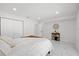 Clean bedroom featuring a closet, marble floors and modern minimalist design at 1413 E 108Th Ave, Tampa, FL 33612
