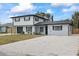 Charming home with a gravel driveway, complemented by fresh exterior paint and new landscaping elements at 1413 E 108Th Ave, Tampa, FL 33612